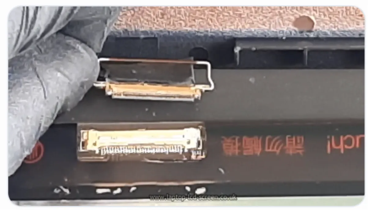 Pull LCD cable from LCD