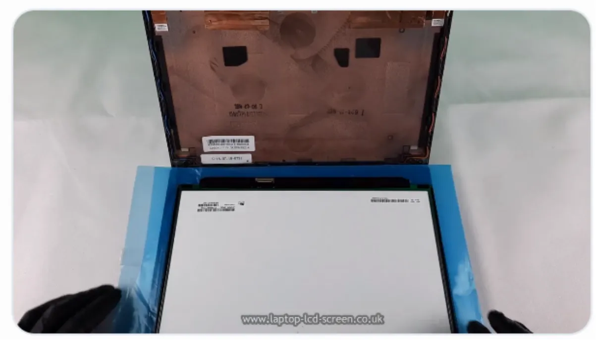 Lay replacement screen on keyboard